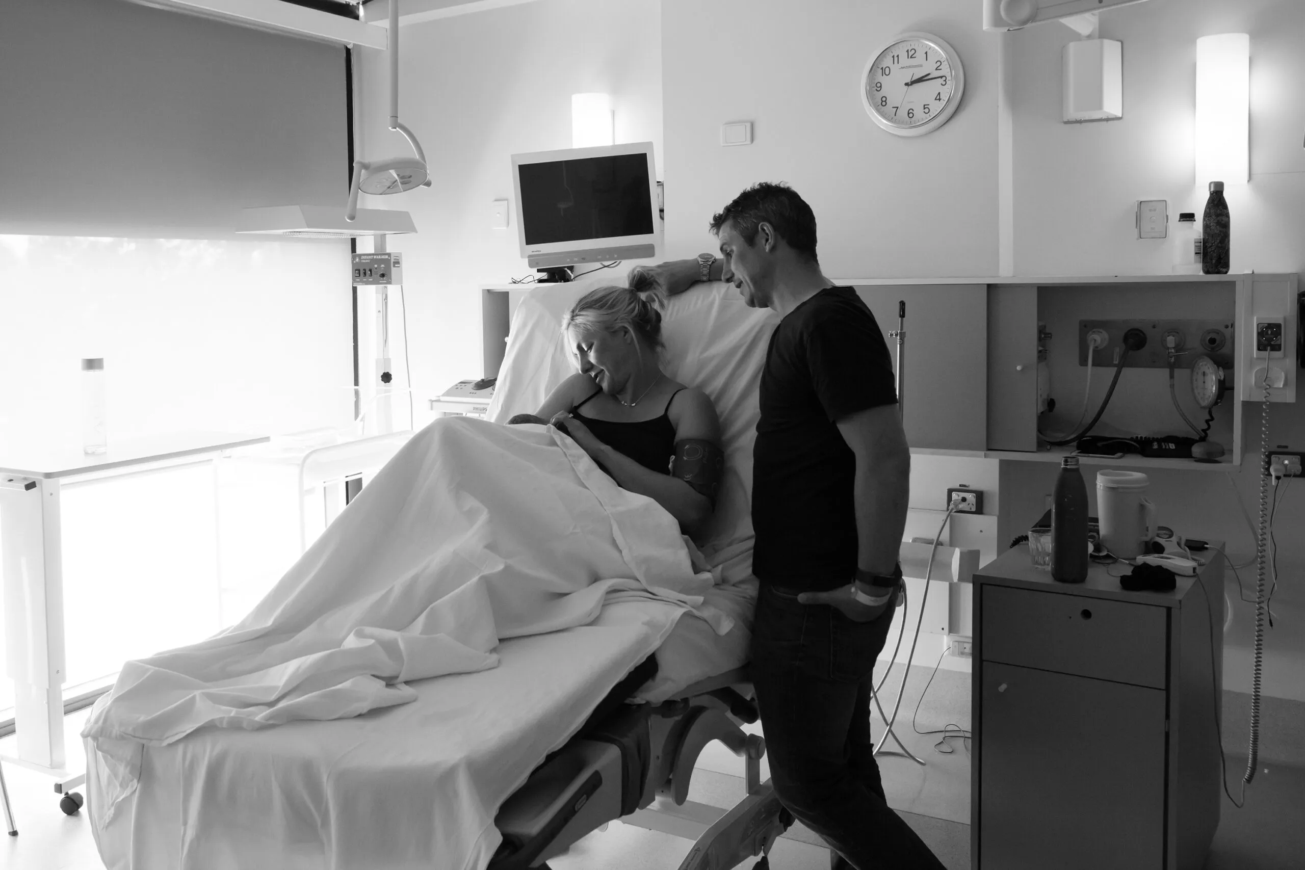 Parents with their newborn after birth